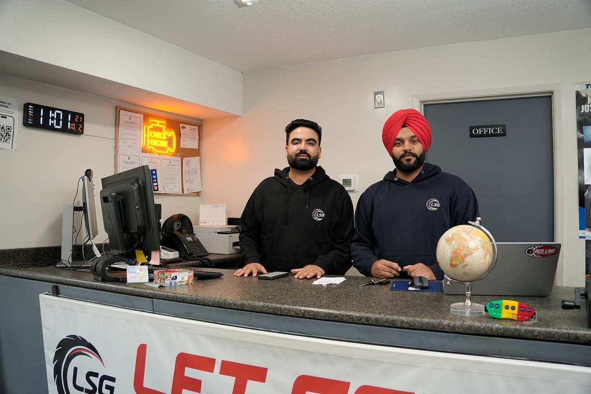 LSG Auto Nation staff at the front desk, ready for walk-ins